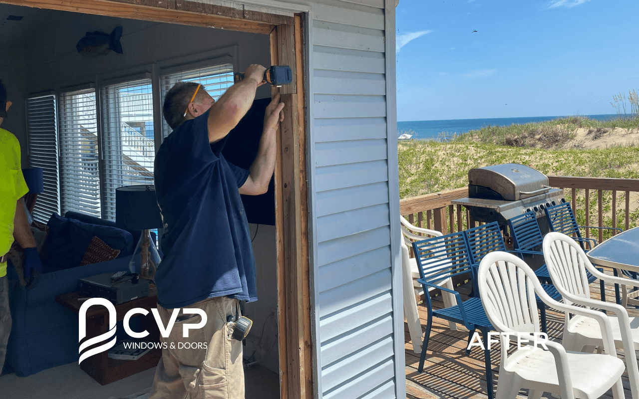 Patio door replacement by a man